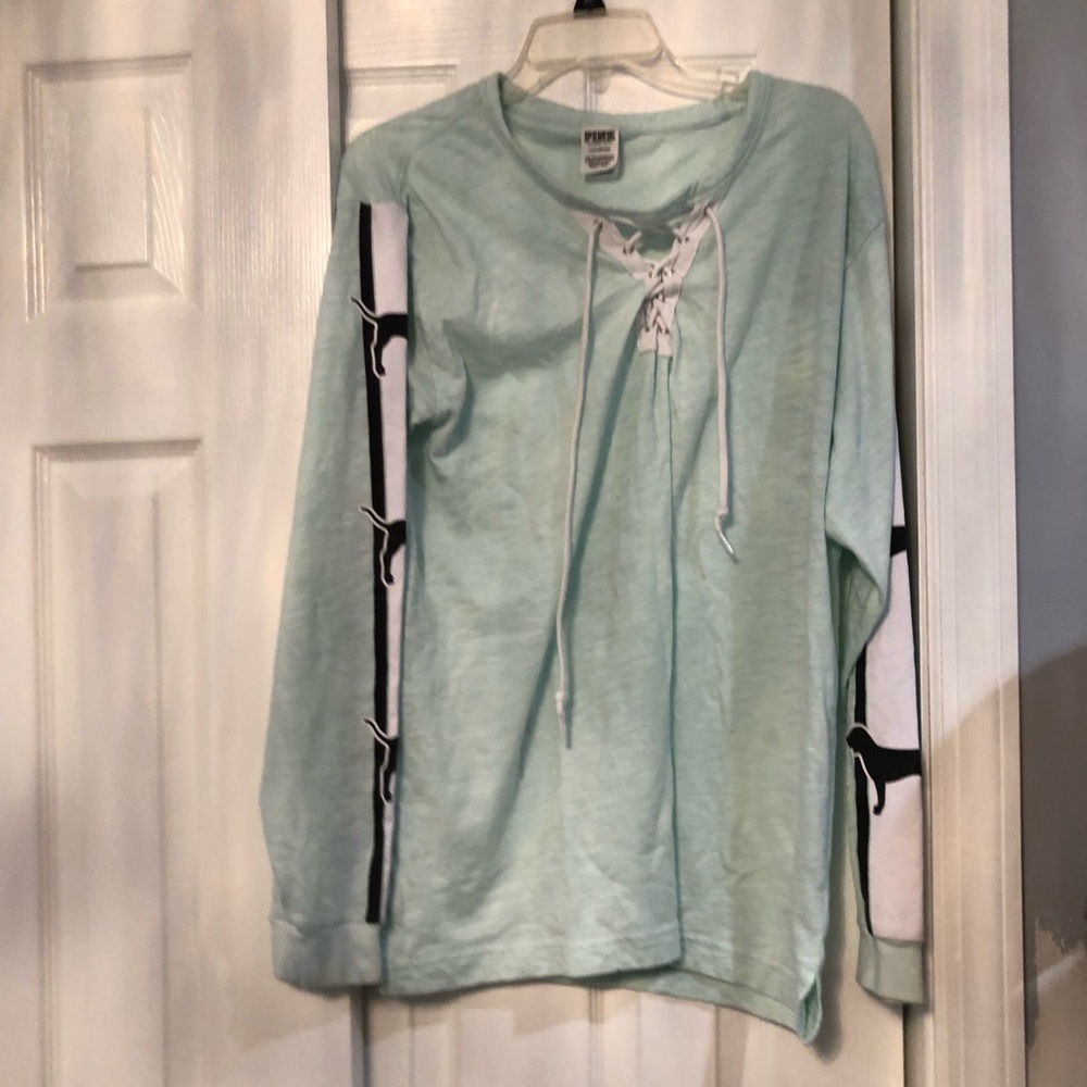 A light baby blue long sleeve shirt